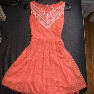 Salmon pink lace dress with white detail